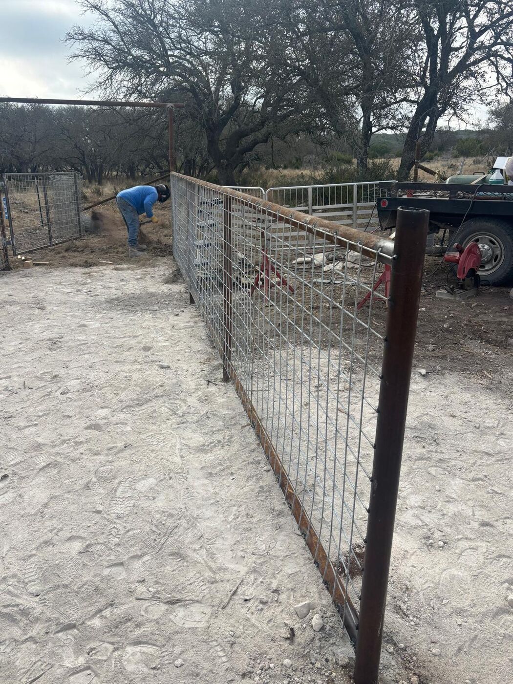 Custom welded steel gate panel on heavy pipe posts